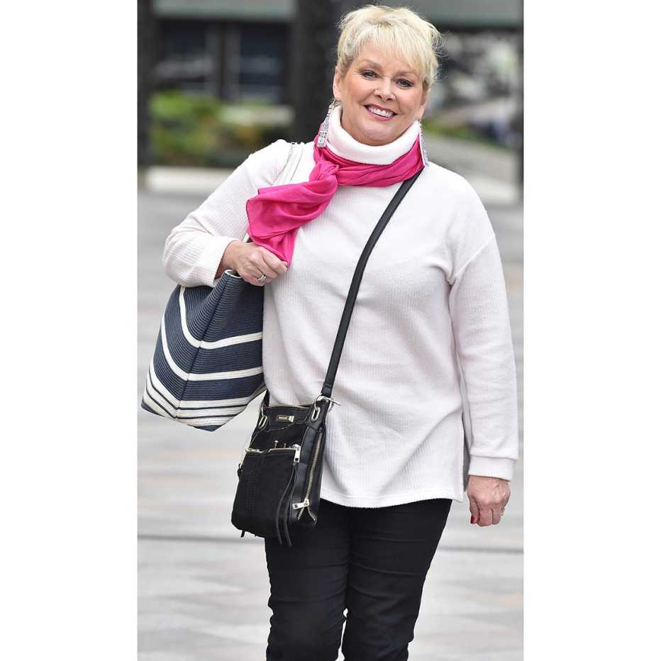 Cheryl Baker with two handbags