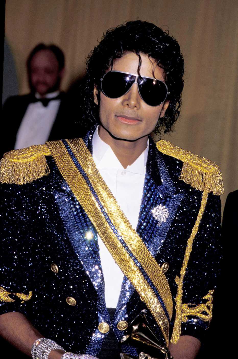 Michael Jackson wearing sunglasses at the 26th Annual Grammy Awards