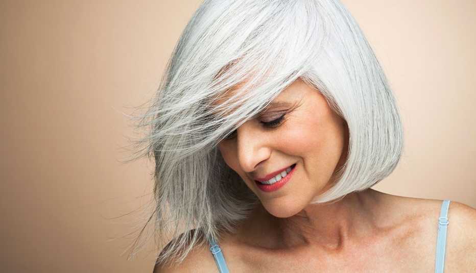 a woman with grey hair in a bob cut