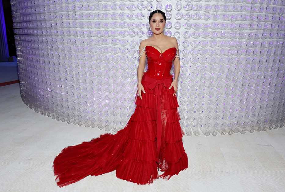 Salma Hayek Pinault wearing a red dress at The 2023 Met Gala held at The Metropolitan Museum of Art in New York City