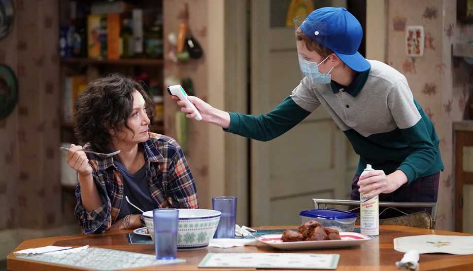 Sara Gilbert and Ames McNamara in a scene from The Conners