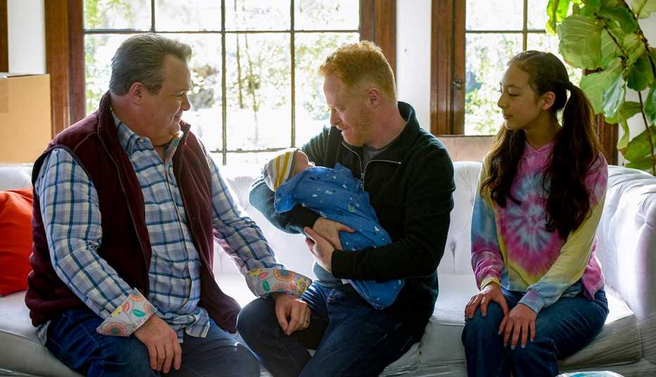 Eric Stonestreet Jesse Tyler Ferguson and Aubrey Anderson Emmons in the Season 11 episode of I'm Going to Miss This of Modern Family