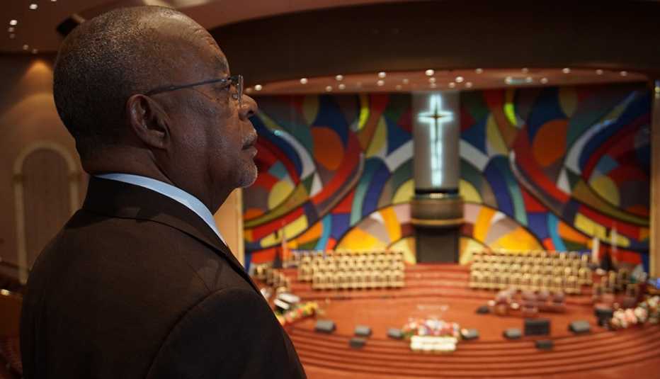 Henry Louis Gates Jr. looks at a mural at the West Angeles Church Of God In Christ
