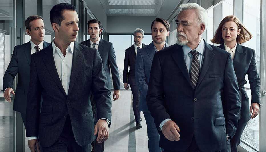 The cast of Succession walking together in a hallway