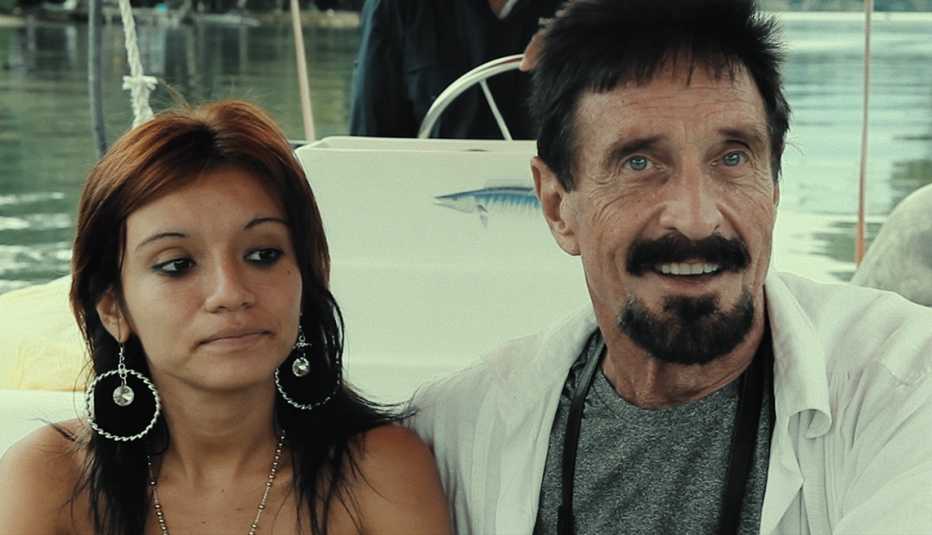 Sam Herrera and John McAfee in a scene from the Netflix documentary Running With the Devil: The Wild World of John McAfee