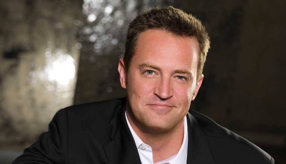 Actor Matthew Perry smiling for a portrait.