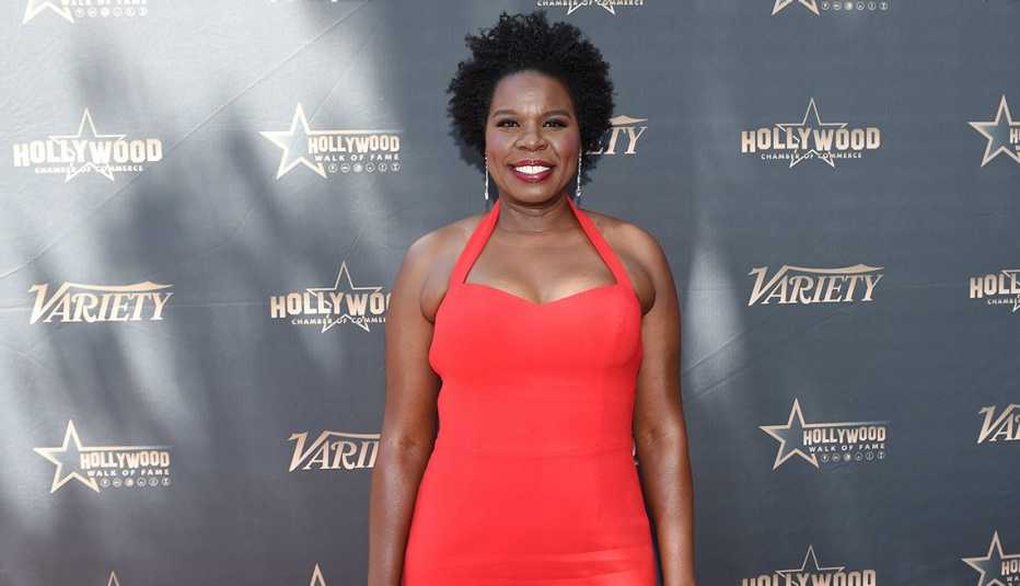 Leslie Jones wearing a red dress at the Hollywood Walk of Fame Star Ceremony honoring Kenan Thompson