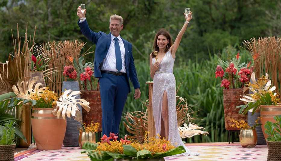 Gerry Turner and Theresa raise their glass in the air after she accepted Gerry's marriage proposal.