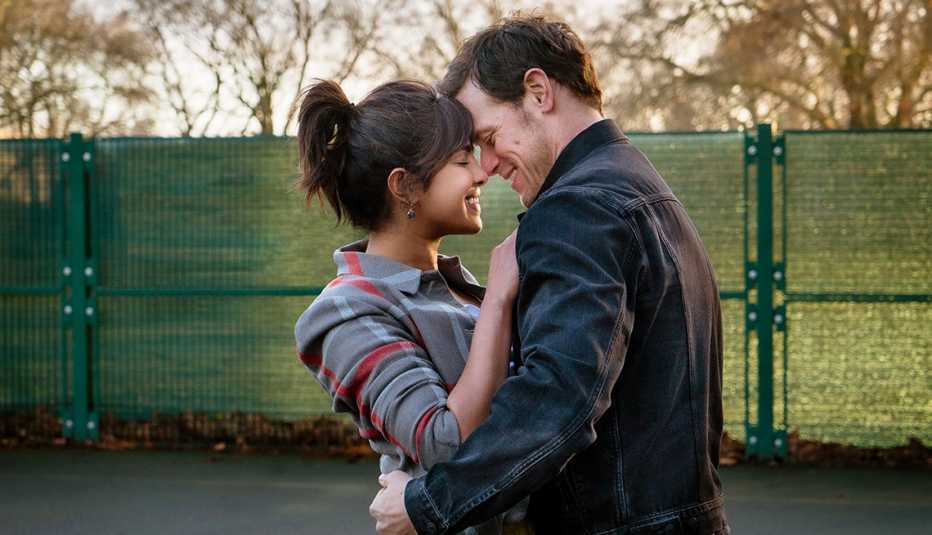 Priyanka Chopra Jonas and Sam Heughan embrace for a kiss in a scene from the film Love Again