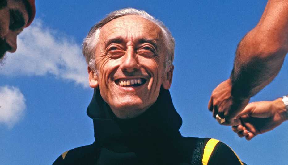 jacques yves cousteau and his crew preparing for a dive on the undersea world of jacques cousteau