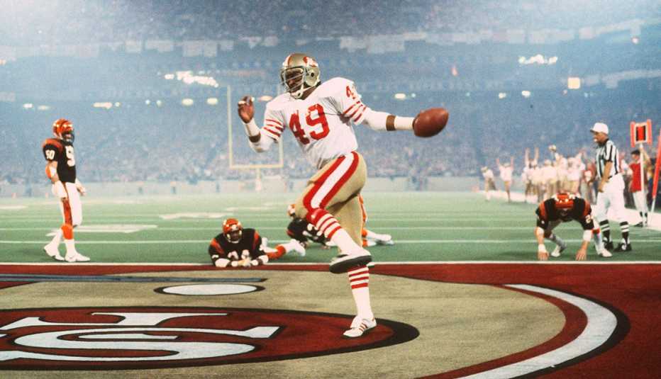 earl cooper number forty nine of the san francisco forty niners celebrating after a touchdown against the cincinnati bengals in super bowl x v i in nineteen eighty two