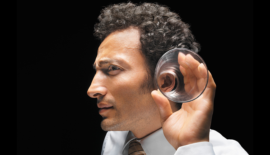 Man uses glass to hear better