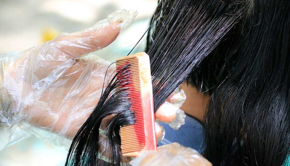 A person getting their hair colored