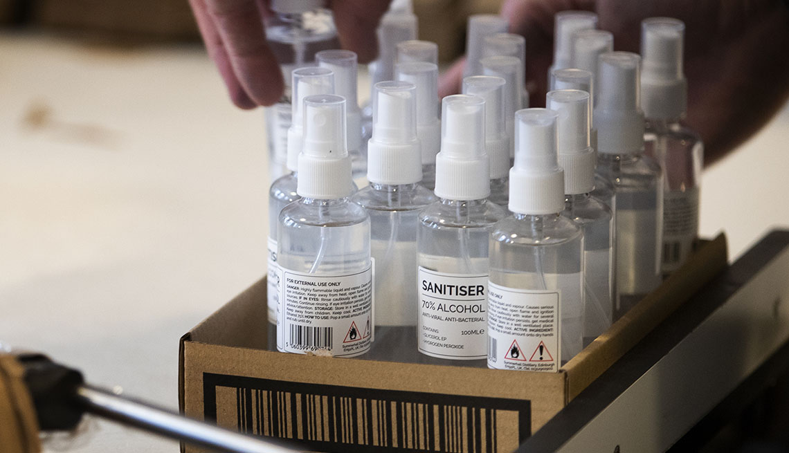 Bottles of hand sanitizer that have been produced by a distillery 