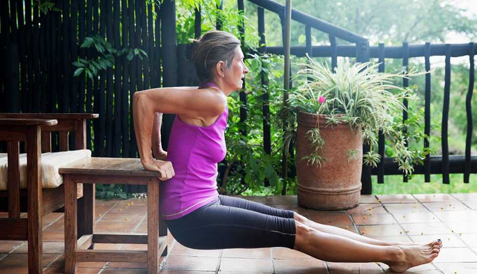 woman exercising outdoor on her patio