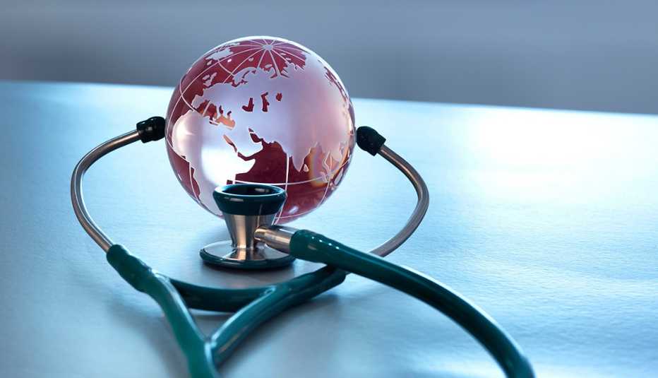 Glass globe with stethoscope