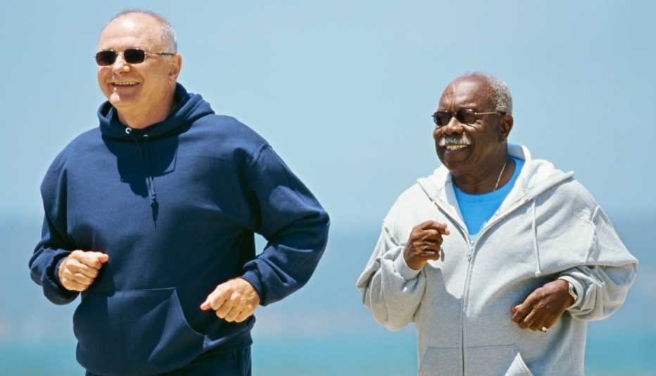 two men in sunglasses jogging
