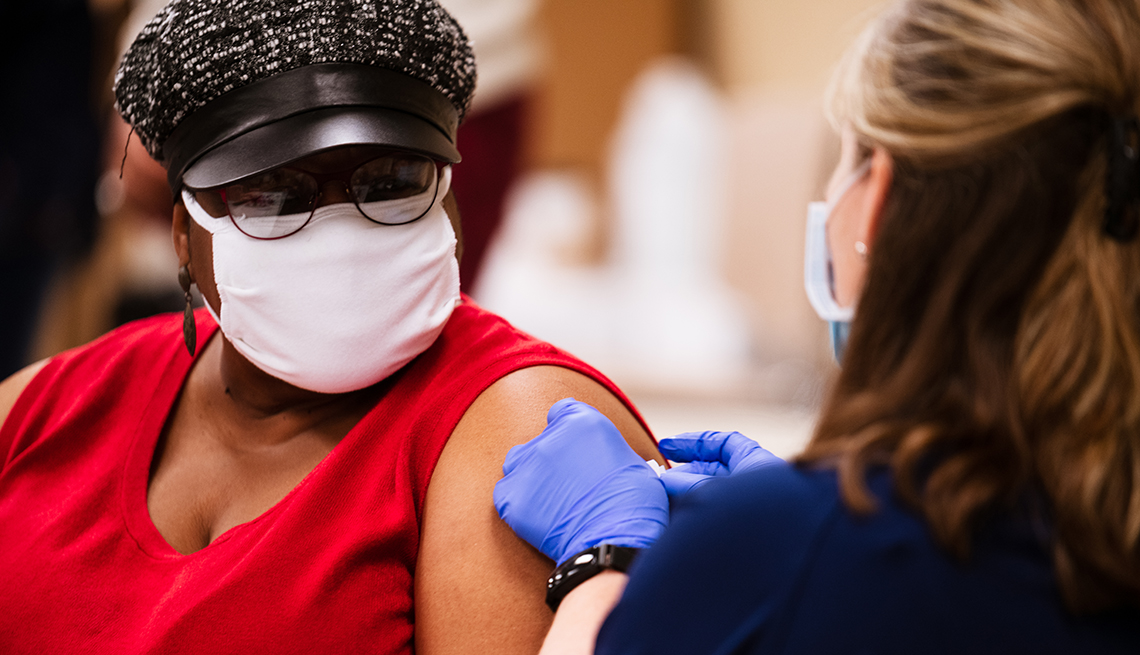  Shanta King receives the Moderna COVID-19 vaccine