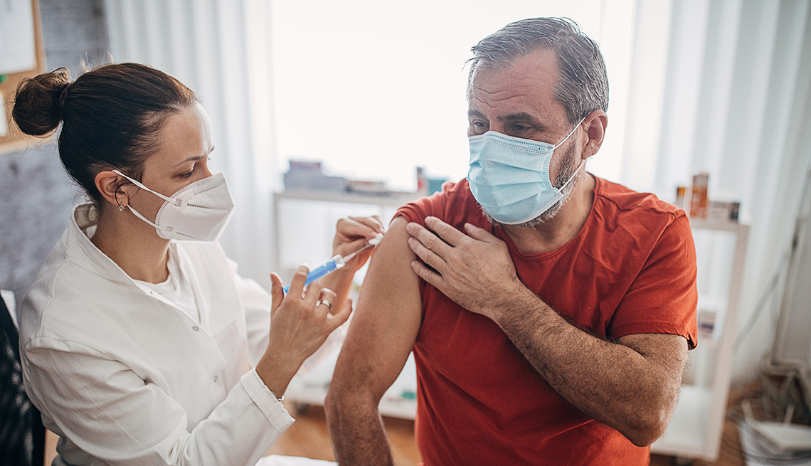 Older man getting the COVID-19 vaccine