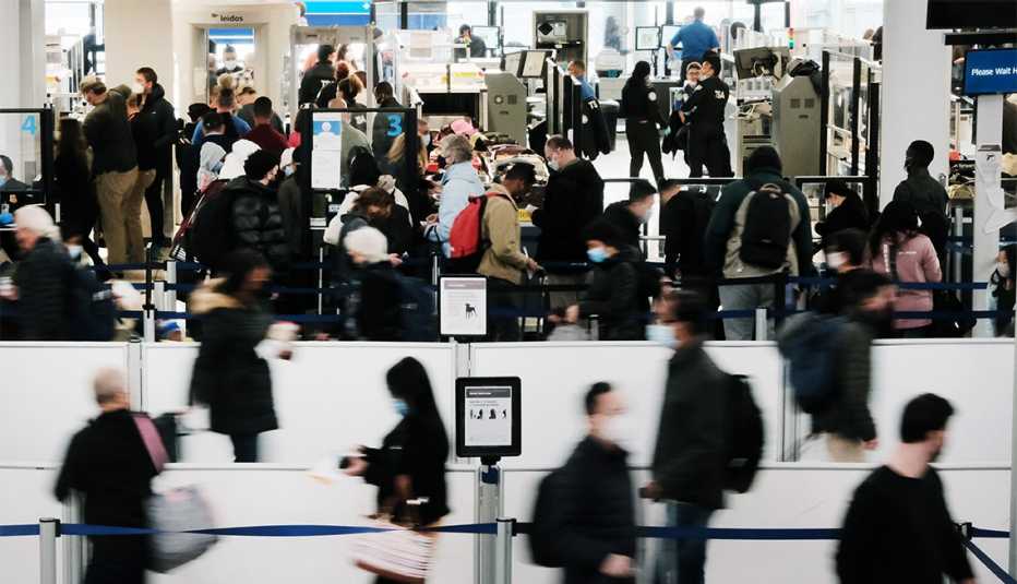 Passengers at Newark Liberty International Airport on November 30, 2021
