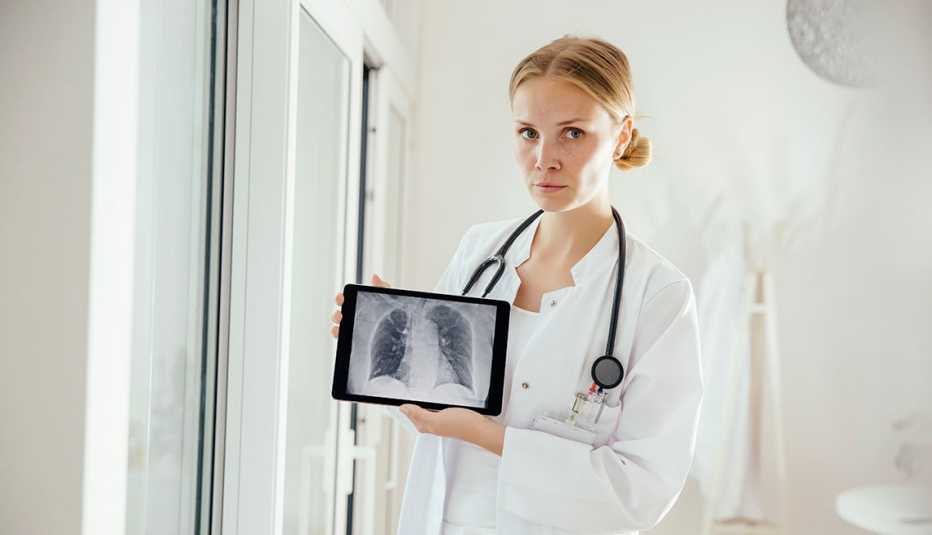 doctor holding lung scan