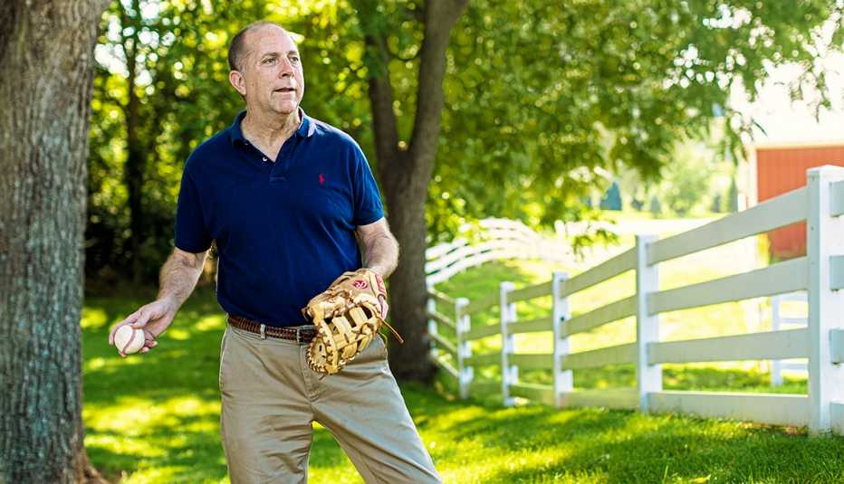 Mark Witman overcame his Parkinson’s symptoms and is back playing catch with his son. 