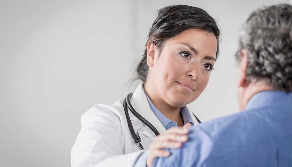 Latina doctor speaking with patient