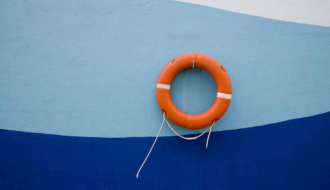 life preserver on wall of cruise ship pier