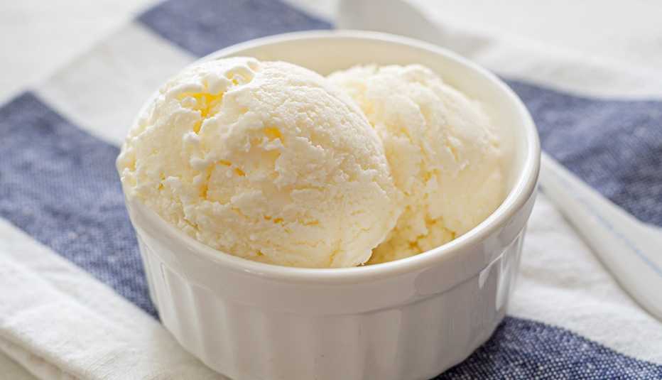 Vanilla Ice Cream  In Bowl On Table