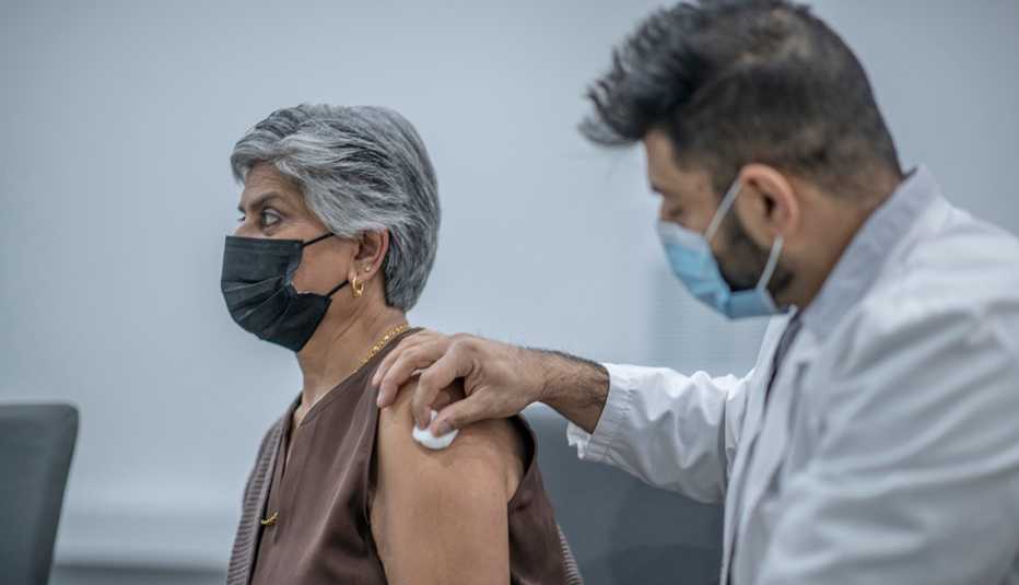 a woman receiving a vaccination
