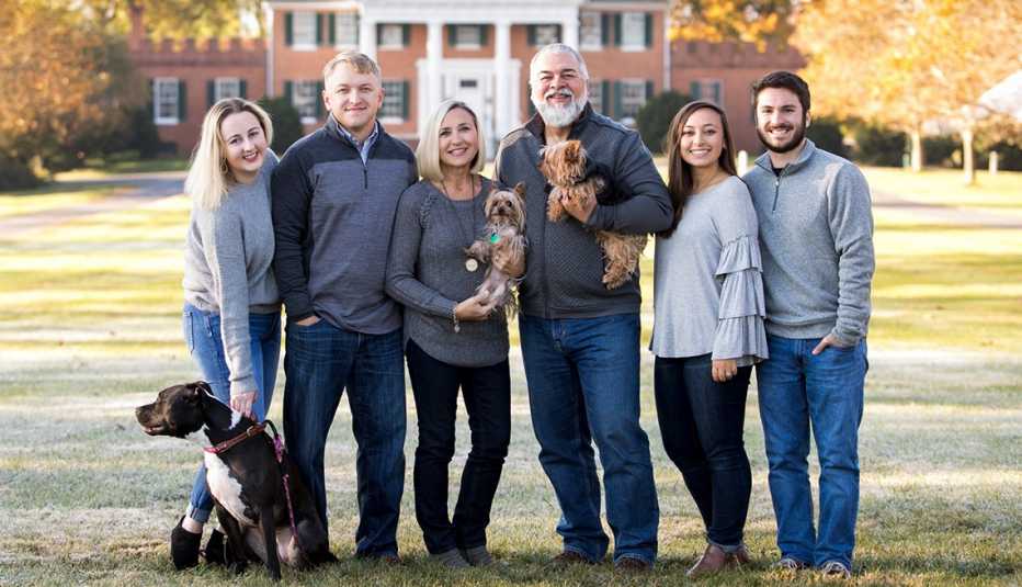 teresa jackson with her family her husband their dogs her adult children and their spouses