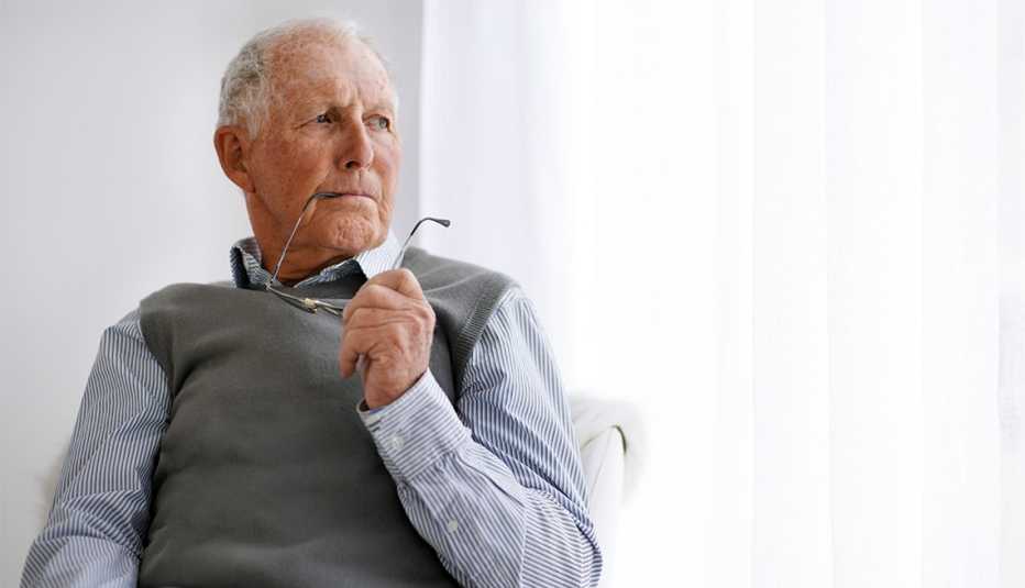 An elderly man in a pensive mood