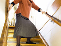 Anti-depressants are linked to nursing home falls - woman on stairs