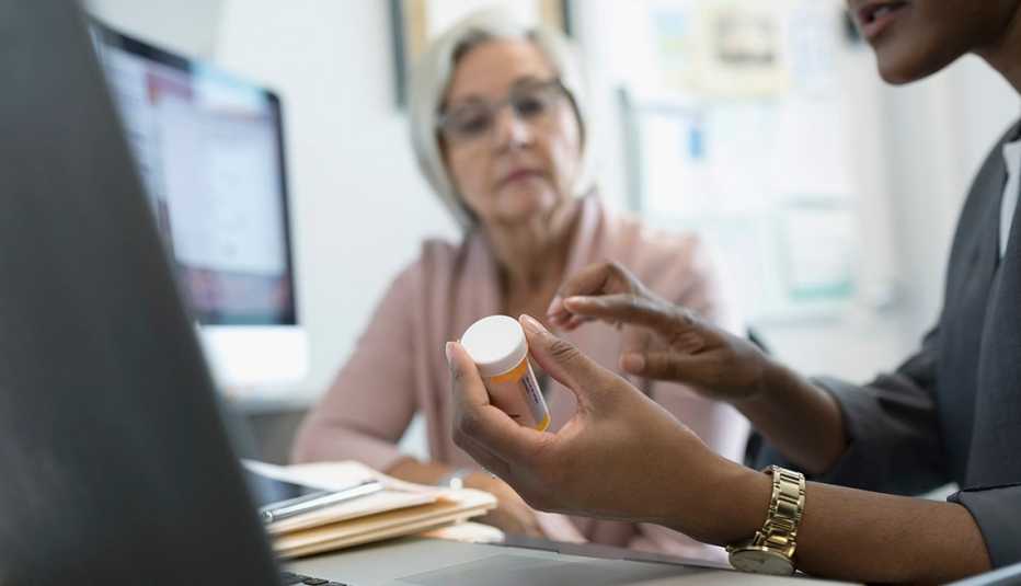 Doctor and patient discuss prescription medication
