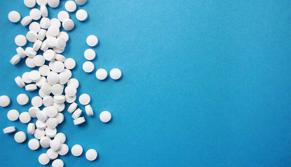 Aspirin on a blue background