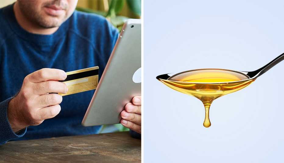 a man ordering something online with a credit card and a spoonful of  liquid honey supplement