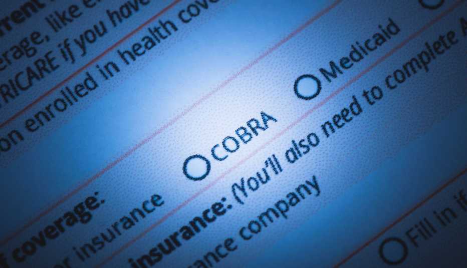 close shot of electronic health insurance application form featuring the word cobra