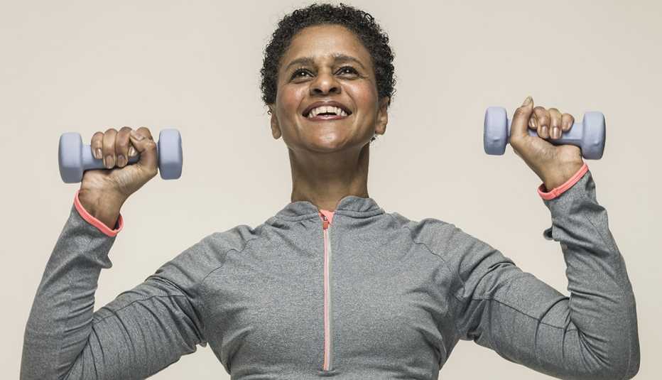 Woman lifts weights,  Jump-Start Your Fitness