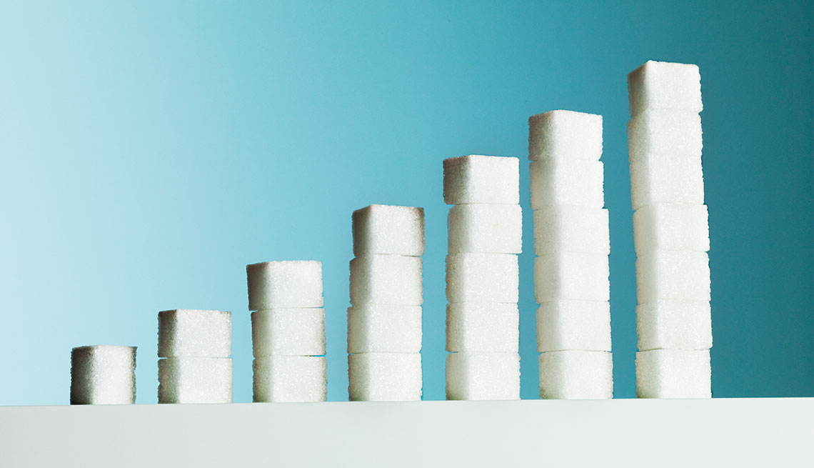 Row of ascending stacks of sugar cubes