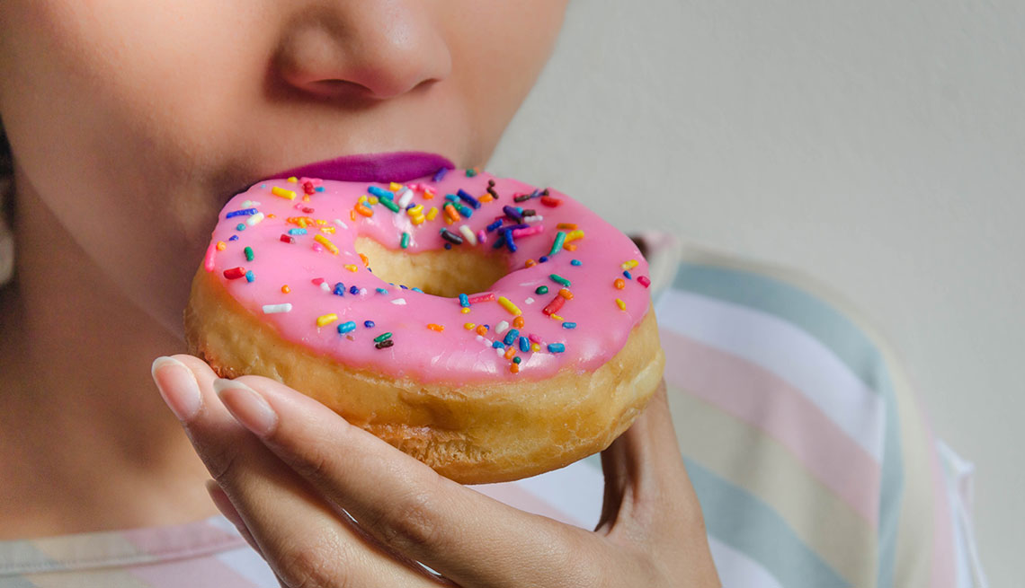 woman eating donut 