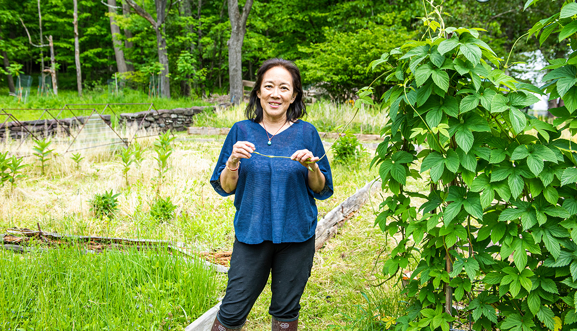 Tama Matsuoka Wong standing in her backyard
