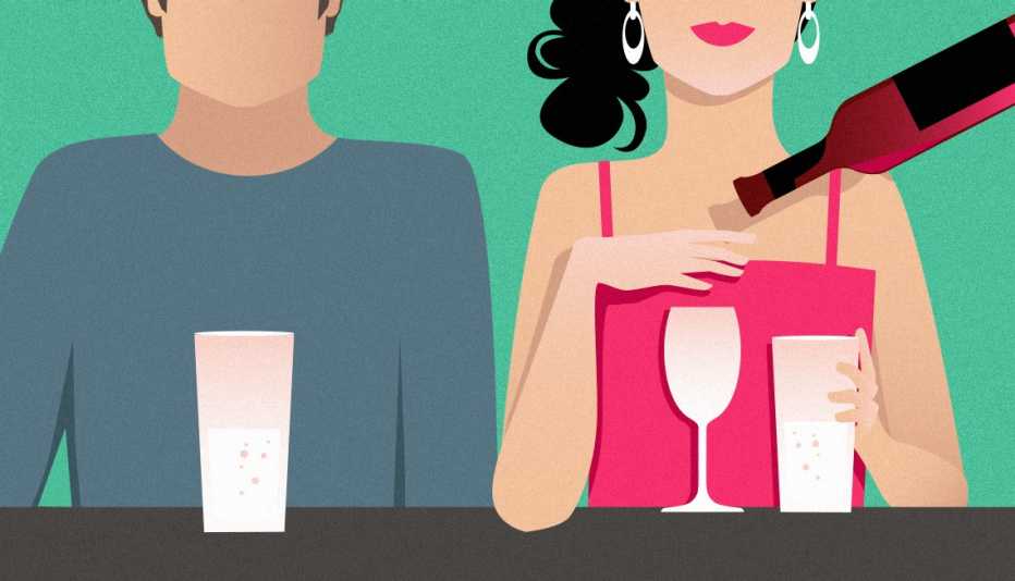 couple sitting at a table drinking sparkling water and woman saying no to wine
