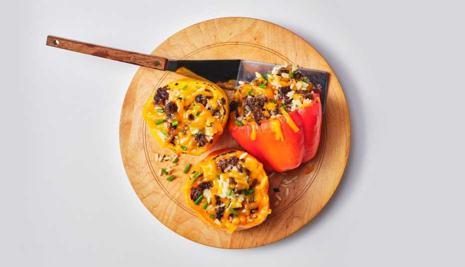 a plate of burger stuffed peppers