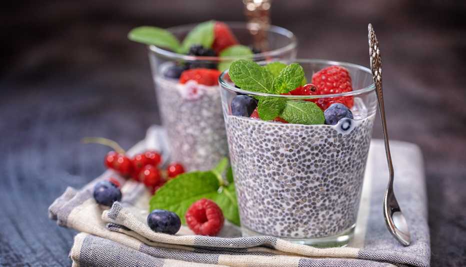Two glasses of chia seed pudding with fruit