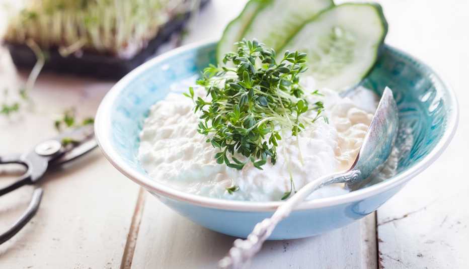 cottage cheese and cucumbers in a bowl