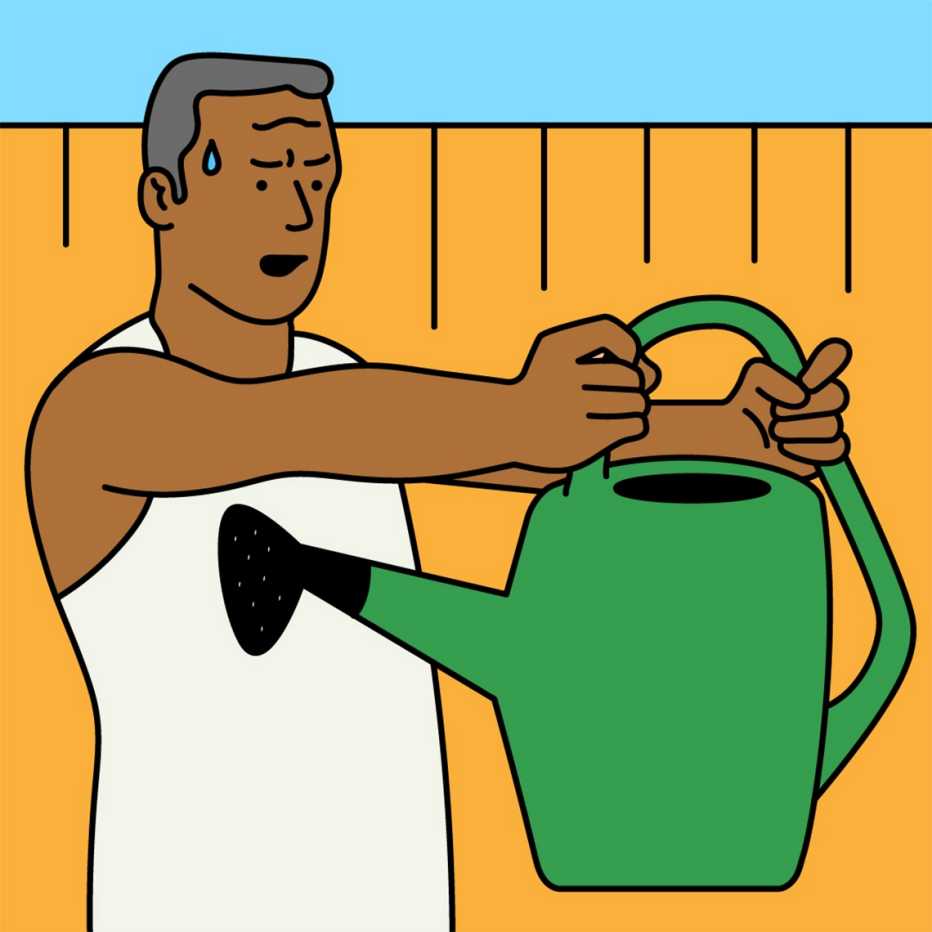 a sweating man holding a watering can