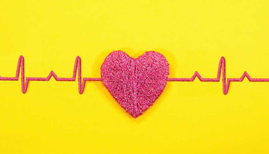 an example of a heart rate monitor made from a pink heart on a bright yellow background