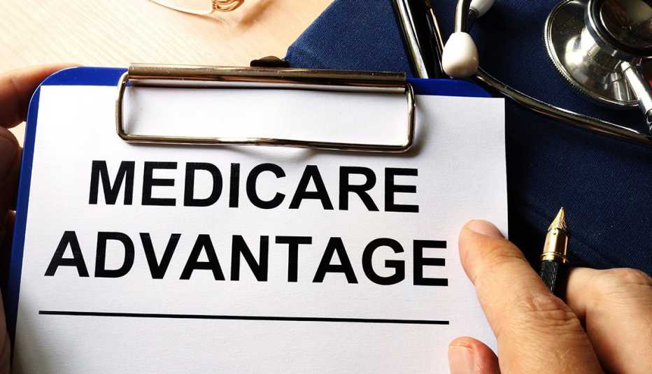 Medicare advantage in a clipboard. Health care insurance concept.