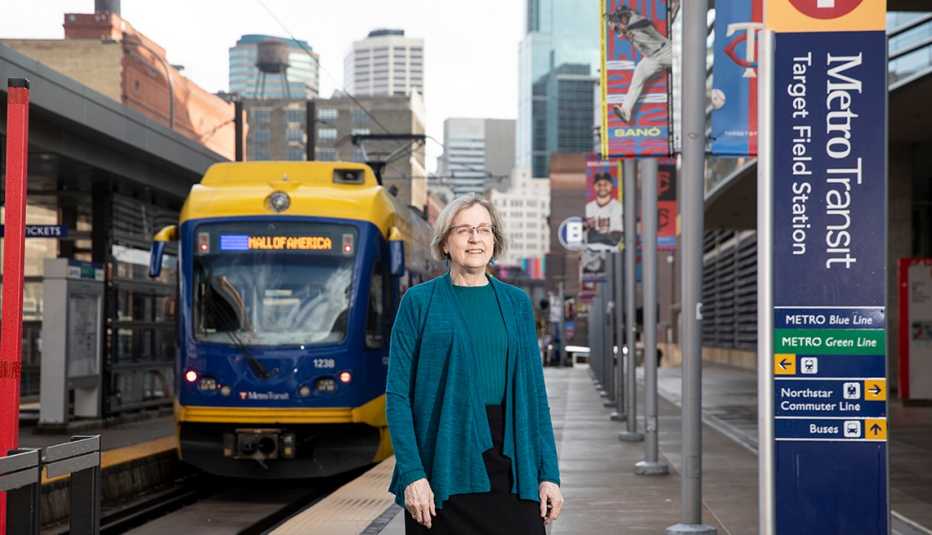 Woman Lucy Galbraith standing at a metro transit center in Minneapolis Minnesota