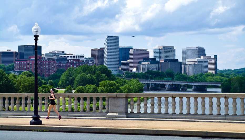Woman running on the bridge over the Potomac River between Washington DC and Arlington VA